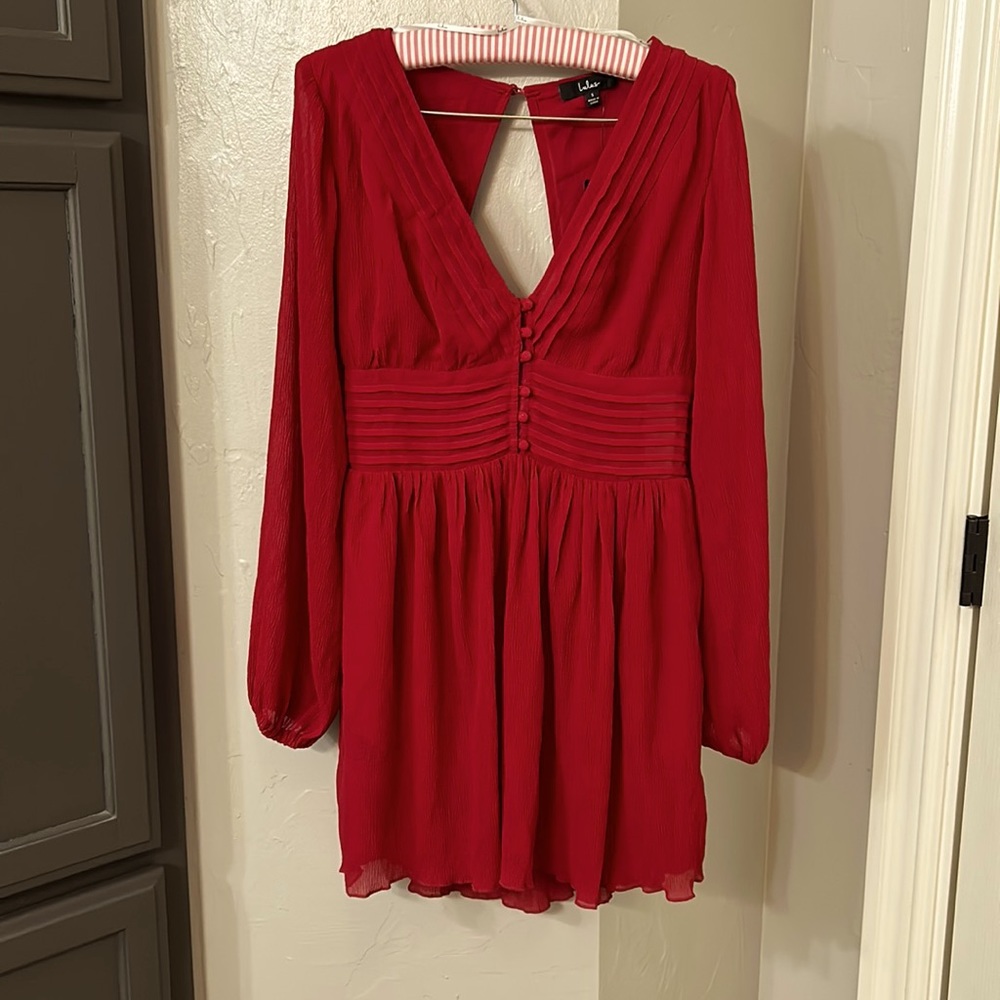 Never worn, red dress from LuLu's.  Long sleeve with keyhole back.